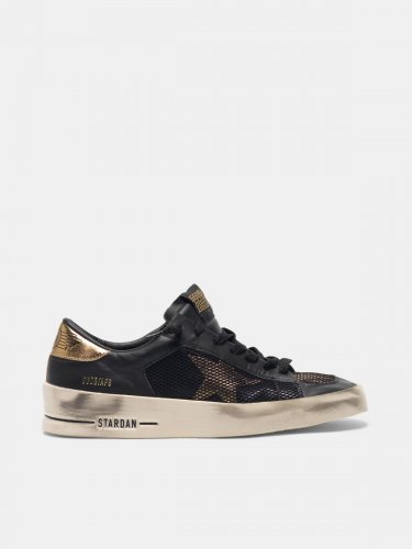 Stardan sneakers in black and gold leather with mesh inserts
