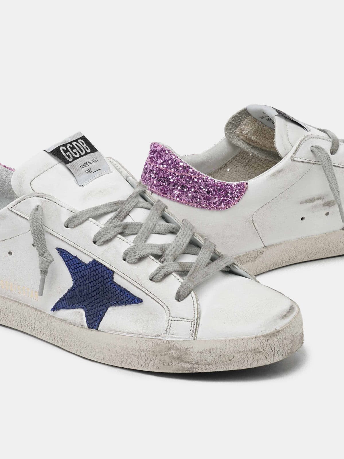 White Super-Star sneakers with blue star and glittery heel tab